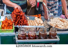 Ducklings on skewers and fish flour balls