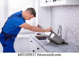Handyman Fixing Kitchen Sink Handyman Fixing Kitchen Sink