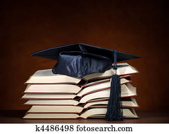 Opened books with graduation cap Opened books with graduation cap