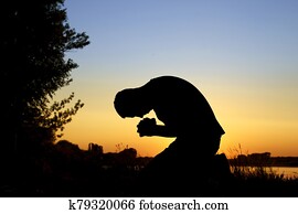 silhouette man praying silhouette man praying
