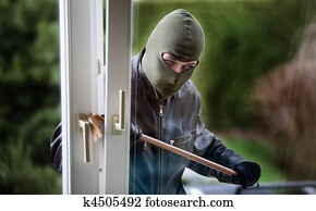 Burglar at a window Burglar at a window