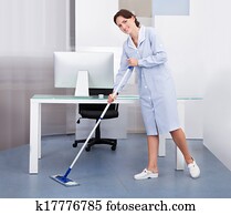 Maid Cleaning Floor In Office Maid Cleaning Floor In Office