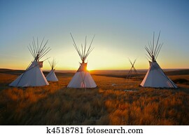 Tipis at sunrise on the prairie Tipis at sunrise on the prairie
