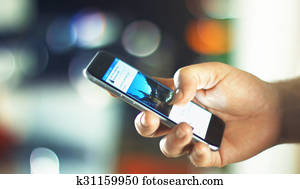 Business Man using Apple iPhone 6s in Office Business Man using Apple iPhone 6s in Office