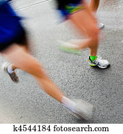 People running in city marathon People running in city marathon