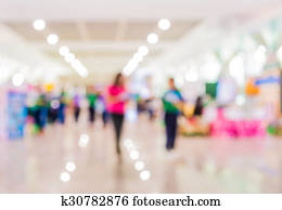 blurred image of people at trade show blurred image of people at trade show