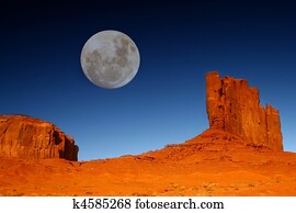 Buttes and Moon in Monument Valley Arizona