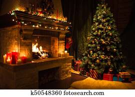 Living room interior with decorated fireplace and christmas tree Living room interior with decorated fireplace and christmas tree