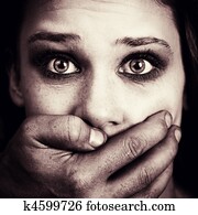 Scared woman victim of domestic torture and abuse Scared woman victim of domestic torture and abuse