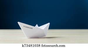 Origami boat with the word Vision on it Origami boat with the word Vision on it