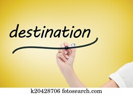 Businesswoman writing the word destination