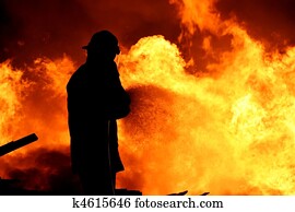 Fireman fighting a fire Fireman fighting a fire