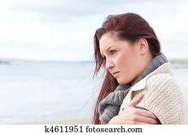 Woman all alone on the beach