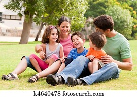 Happy family having fun in the park