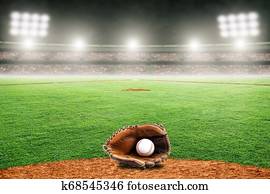 Baseball Glove and Ball on Field in Outdoor Stadium With Copy Space
