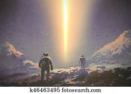 astronauts walking to mystery light beam astronauts walking to mystery light beam
