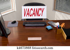 Desk and Vacancy Sign