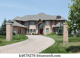 Luxury brick home with pillars