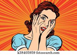 Attractive woman covering her face with both hands