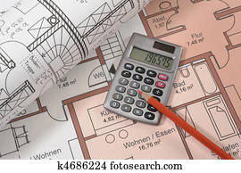 financial calculator on blueprint