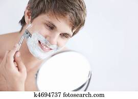 Shaving a man Shaving a man
