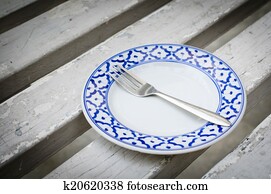  fork on vintage empty plate