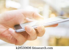 hand with cell phone hand with cell phone