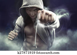 Hooded boxer punching an enemy Hooded boxer punching an enemy