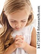 Little girl praying Little girl praying