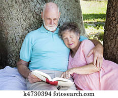 Beautiful Senior Couple Reading