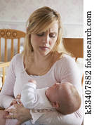 Frustrated Mother Suffering From Post Natal Depression Frustrated Mother Suffering From Post Natal Depression