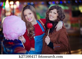 teens at fair with candy teens at fair with candy