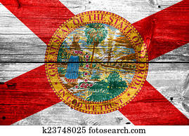 Florida State Flag painted on old wood plank texture Florida State Flag painted on old wood plank texture