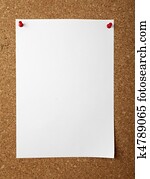 notes with push pins on cork board office business