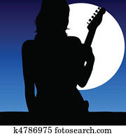 woman with a guitar in the moonlight