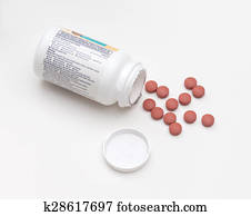 Ibuprofen Bottle with Pills