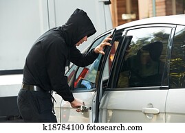 thief burglar at automobile car stealing