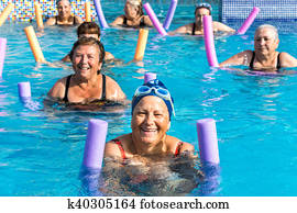 Group of senior women at aqua gym session.