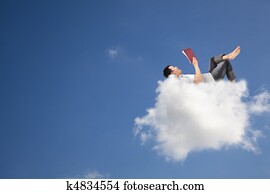 Relax and reading book on the cloud