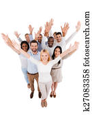 Dream team. Top view of positive diverse group of people in smart casual wear looking at camera and stretching out their hands while standing close to each other