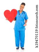 young african american doctor holding heart