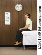 Patient in medical room.