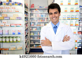 portrait of a male pharmacist at pharmacy portrait of a male pharmacist at pharmacy