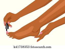 african american woman applying nail polish on her toes african american woman applying nail polish on her toes