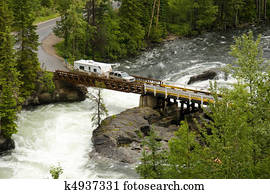 Truck and trailer crossing a river Truck and trailer crossing a river