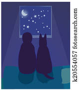 Child and dog look at the night sky