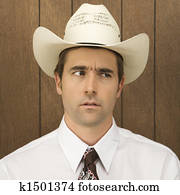 Man wearing cowboy hat.