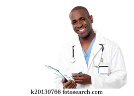 Doctor in a uniform holding a clipboard