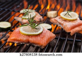 Grilled salmon steaks on fire Grilled salmon steaks on fire