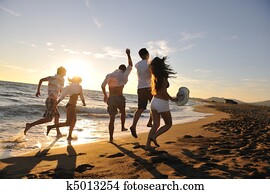 people group running on the beach